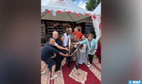 Olympic Torch Makes Stopover at Moroccan Stand in ‘Africa Station’ Fan Zone