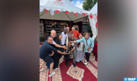 La flamme olympique fait escale au stand marocain de la fan zone “Africa station”